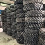  Opona przemysłowa wysokiej jakości 335/80R20 , 12.5R20 DUNLOP SP T9 / 90-100 % BIEŻNIKA