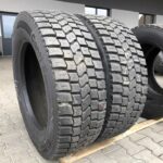  Opony używane do ciężarówki 295/60R22.5 BIEŻNIKOWANA BANDAG BDR-ASD / 18-19mm