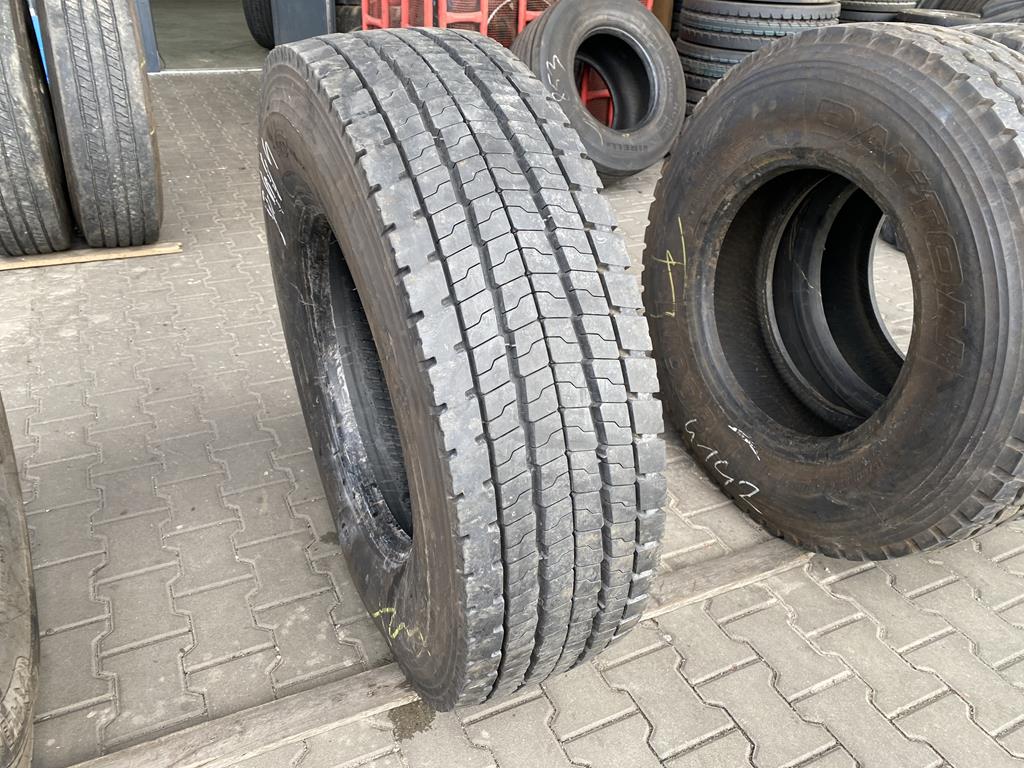 Opony ciężarowe Używana opona ciężarowa napędowa 315/80R22.5 BRIDGESTONE M749 / 14-16mm