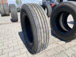 Opona ciężarowa używana prowadząca 245/70R19.5 FIRESTONE FS411 / 8-9mm