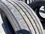 Opona ciężarowa używana prowadząca 245/70R19.5 FIRESTONE FS411 / 8-9mm