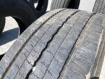 Opona ciężarowa używana prowadząca 295/80R22.5 FIRESTONE FS424 ENLITEN / 11-12mm